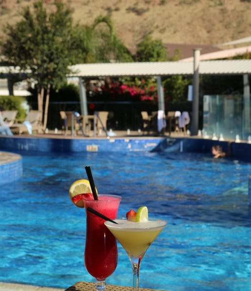 Cocktails at Lasseters pool