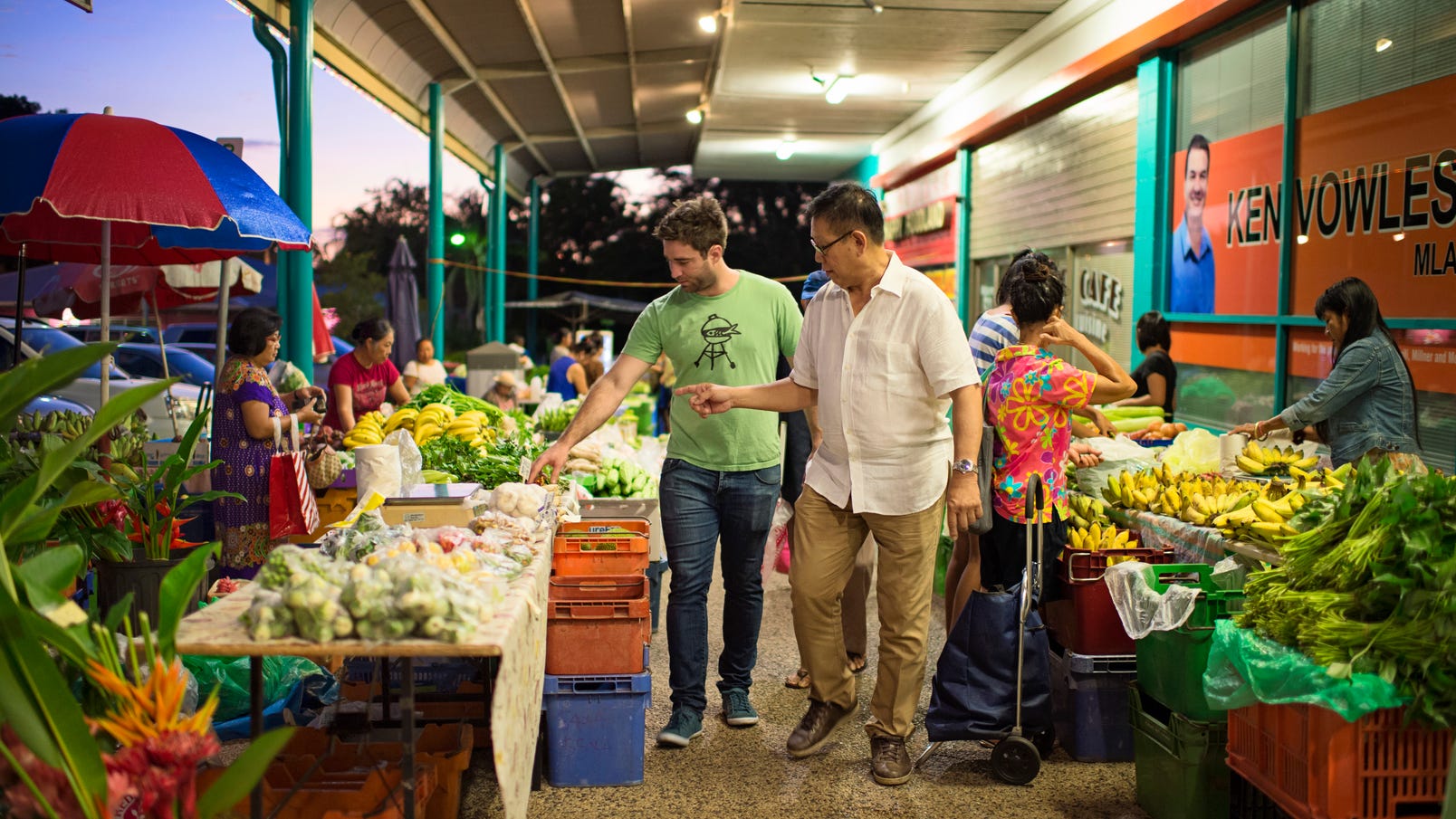 Local chef Jimmy Shu walking through Rapid Creek Markets