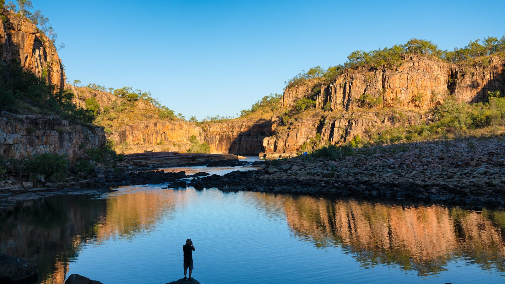 A vistor looking out at Nitmiluk Gorge near Katherine