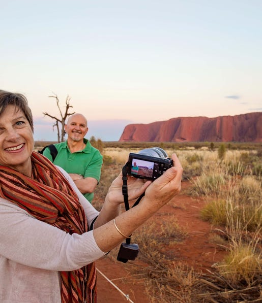 Taking a photo at Uluru