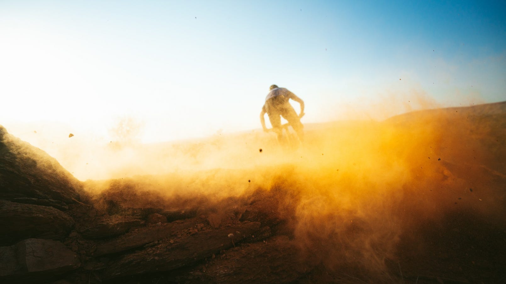 Sunrise Mountain biking in the Red Centre spinning dust