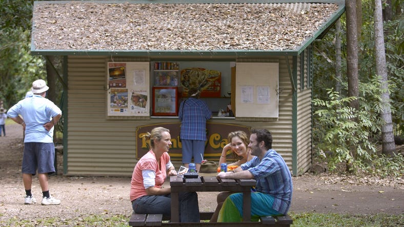 Friends eating at Berry Springs Nature Park The Rainbow Cafe near Darwin